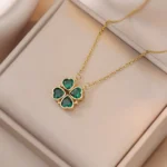 Collier trefle à 4 feuilles doré avec zircon vert transformable en 4 coeurs ELAE